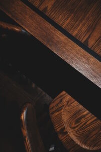 Photo of mahogany chair by Henry & Co. on unsplash.com